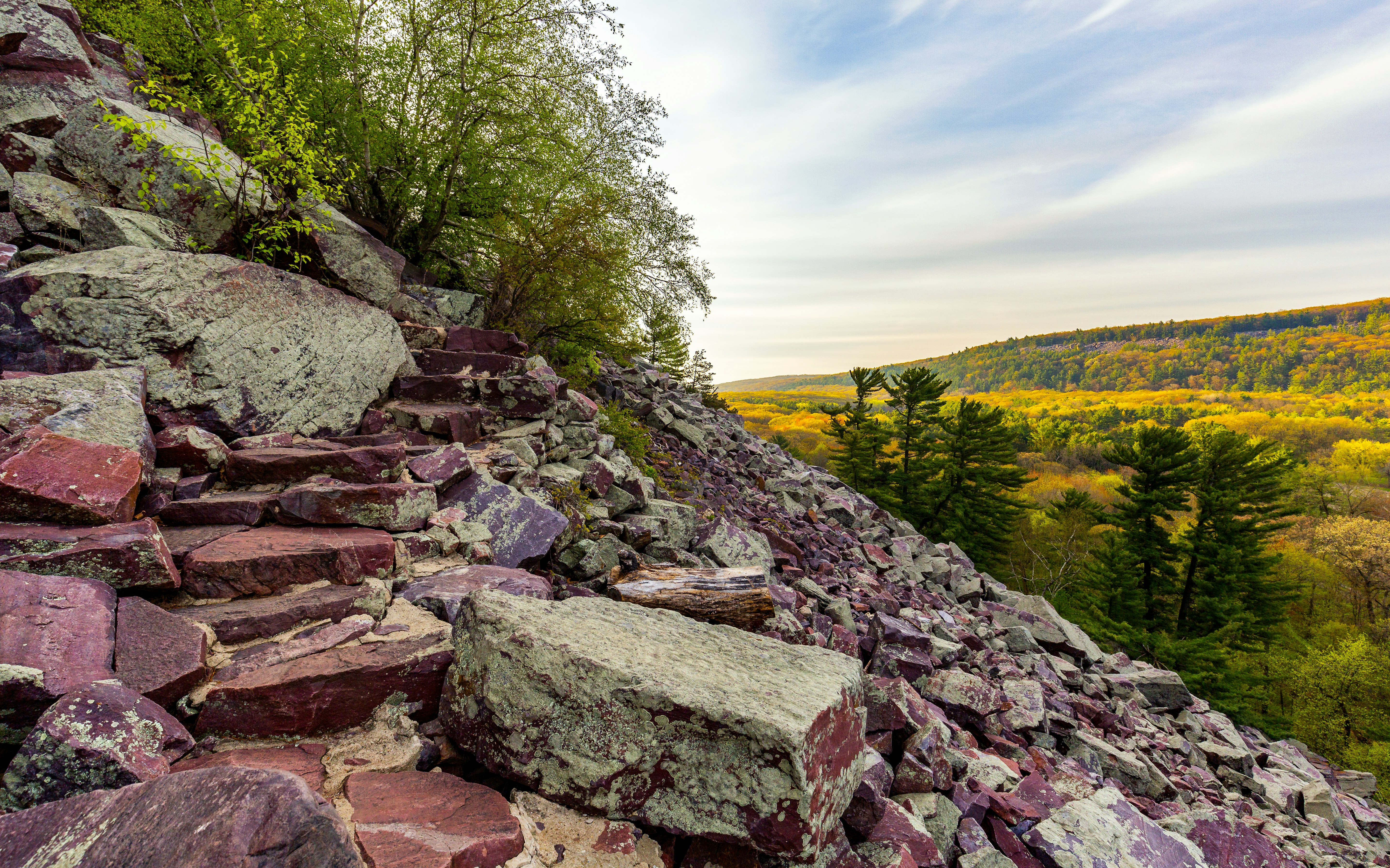 brown rocky trail on slope during daytime